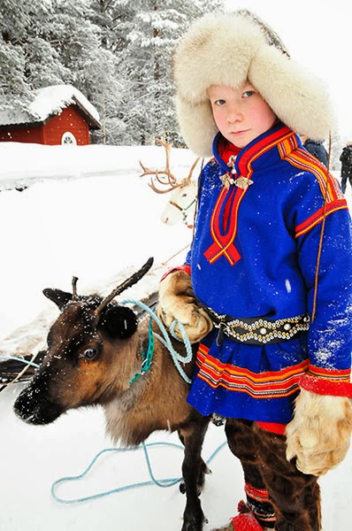 Sámi-teenager-and-reindeer